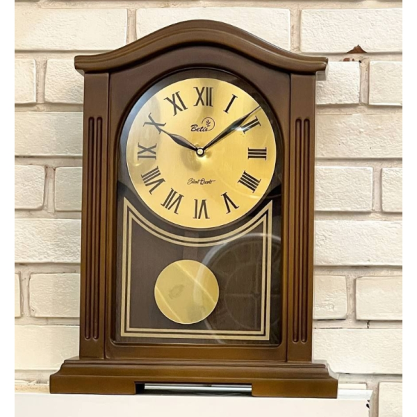 ساعت رومیزی بتیس مدل 3040، ساعت رومیزی لوکس، متریال چوبی بدنه، دارای پاندول مخصوص، ترکیب رنگ قهوه ای چوب و طلایی،  اعداد یونانی